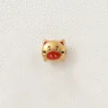Detailed view of a gold-plated stainless steel cartoon pig bead with red enamel - Red Nose Pig (Style 2)