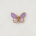 Close-up of the gold-plated butterfly charm featuring purple and pink gradient enamel - Purple Butterfly
