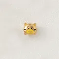 Detailed view of a gold-plated stainless steel pig bead with yellow enamel details - Yellow Ear Nose Pig (Style 3)