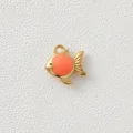 Close-up of a gold-plated stainless steel fish pendant with coral enamel detail - Orange Goldfish