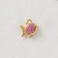 Close-up of a gold-plated stainless steel fish pendant with pink glitter inlay. - Purple Fish