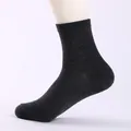 Premium charcoal gray cotton blend crew socks for men featuring reinforced heel and toe - Crew Socks / Dark Gray