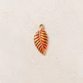 Leaf charm pendant in orange enamel with golden stainless steel finish for jewelry - Orange Leaf Pendant
