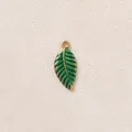 Delicate green leaf pendant charm with gold trim, drip oil finish, stainless steel base. - Emerald Green Leaf Pendant