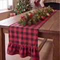 Red and black buffalo plaid Christmas table runner with ruffled edges on a wooden table. - Double Ended Ruffles / 33x122cm / Yarn-dyed Red and Black Plaid