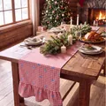 Red checkered Christmas table runner with blue bows and ruffled edges on wooden table - Double Ended Ruffles / 33x122cm / Red and White Plaid with Blue Bows