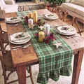 Detail of a rustic green plaid table runner with ruffles in a cozy Christmas setting - Double Ended Ruffles / 33-122cm / Woolen Green Coffee Plaid