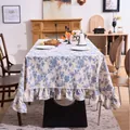 Vintage blue floral tablecloth with elegant ruffled edges for stylish dining room decor - Blue Rose Ruffle / 140-260