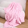 Cozy pink fleece throw blanket with embossed heart pattern displayed on white sofa - 100x150cm / Pink Heart Plush Blanket