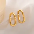 Irregular textured gold oval hoop earrings in high-quality titanium steel for women - Hammered Wave Oval (UB602) / One Pair / Gold