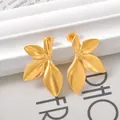 Elegant golden leaf-shaped titanium steel stud earrings with metallic finish. - Three-Lobe Leaf Style (UB618) / One Pair / Gold