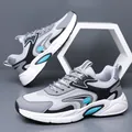 Grey and black men's breathable fly-knit mesh sneakers with cyan accents - 38 / Gray
