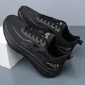 Men's black breathable mesh running shoes featuring flyknit upper and soft cushioned sole - All Black Leather