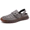 Comfortable men's grey hollow-out summer sandals with adjustable buckle strap and soft sole - Gray