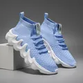 Light blue breathable knit running shoes for men with wavy white sole design - 39 / Blue