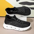 Sneakers a calzino in flyknit con suola ammortizzata bianca per uomo e donna - Bianco e nero