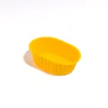Reusable small yellow oval silicone cheesecake mold for baking sweet dessert cups - Yellow