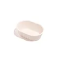 Small oval silicone cheesecake mold with pleated side walls in cream white. - White