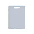 Durable light grey plastic cutting board with non-slip texture and convenient handle hole - M / White