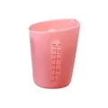 Translucent pink silicone measuring cup featuring dual scale for ounce and cup markings - Pink 16oz