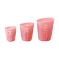 Set of three pink translucent silicone measuring cups with clear ounce and cup markings - Pink 3-Piece Set