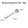 Stainless steel coffee scoop with integrated bag clip for sealing milk powder bags - Measuring Scoop Clip