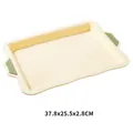 Cream yellow silicone baking tray with green handles, measuring 37.8 x 25.5 x 2.8 CM. - Medium Rectangular Cake Mold (37.8x25.5x2.8cm)