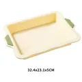 Reinforced silicone baking pan in cream yellow with green handles, 32.4x23.1x5cm - Small Rectangular Cake Mold (32.4x23.1x5cm)
