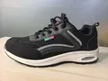 Detail view of men's breathable black mesh walking shoe with comfortable air cushion - 39 / Black and White