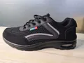Detailed side view of men's black mesh breathable sneakers with visible air cushion - 39 / All Black