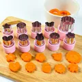 12-piece stainless steel vegetable and cookie cutter set with pink PP hand guards. - 10-Piece Set / Pink