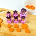 Stainless steel vegetable and fruit cutters with purple handles on a wooden board. - 6-Piece Set / Purple