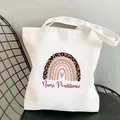 White canvas tote bag featuring a leopard rainbow design and Nurse Practitioner text - Leopard Rainbow NP Print (4) / 35*40cm