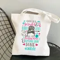 Detail of white canvas tote bag with colorful CNA Life nurse-themed print and text. - CNA Life Print (3) / 35*40cm