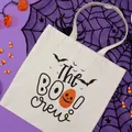 Detail view of white canvas Halloween tote bag featuring pumpkin and bat graphics - Pumpkin Smile Bat Style (7) / 35*40cm