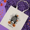 Detailed close-up of a Halloween canvas tote bag featuring spooky skull and pumpkin designs - Coffin Pumpkin Slogan Style (2) / 35*40cm