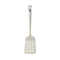 Professional slotted cream silicone spatula with ergonomic handle and chrome hanging loop - Slotted Spatula