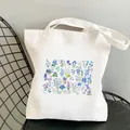 White canvas tote bag featuring intricate blue botanical floral watercolor illustrations - Blue and Purple Floral Style(STD318-A) / 1 Piece
