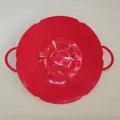 Heat-resistant red silicone spill stopper lid with flower petal design and handles - Red