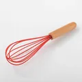 Professional red silicone whisk with a natural wooden handle for baking and mixing. - Whisk