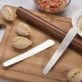 Professional 304 stainless steel dumpling filling spoons on a wooden cutting board - Stainless Steel Original