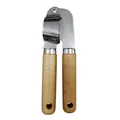 Durable stainless steel garlic press featuring ergonomic wooden handles and hanging holes. - Garlic Press