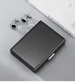 Sleek black brushed stainless steel card holder with elegant cufflinks on a desk - 10 Card Slots / Black