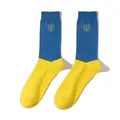 Detailed shot of blue and yellow Ukraine flag socks featuring an embroidered national crest. - Women's Mid-Calf Socks