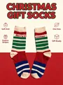 Detail view of colorful festive striped Christmas socks featuring Merry Christmas knit text - Size 33-46 / Blue Red Stripe Christmas Greeting (17)