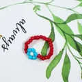 Handmade bohemian red bead ring with blue flower detail - Red with Blue and White Flower (Style 3)