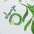 Bohemian style green seed bead ring featuring a delicate white daisy flower charm - Light Green With Flower (Style 11)