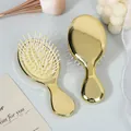 Portable mini gold-plated air cushion hairbrush designed for gentle scalp massage and travel - Electroplated Gold (Yellow Cushion)