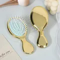 Mini portable air cushion hairbrush with an elegant shiny electroplated gold finish - Electroplated Gold (Blue Cushion)