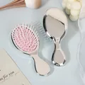 Portable mini silver electroplated air cushion hairbrush for gentle hair massage and travel. - Electroplated Silver (Pink Cushion)